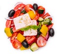 Greek salad of organic vegetables with tomatoes, cucumber, red onion, olives Royalty Free Stock Photo