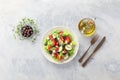 Greek salad. A plate of fresh salad with lettuce, feta cheese, tomatoes, cucumbers etc