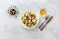 Greek salad. A plate of fresh salad with lettuce, feta cheese, tomatoes, cucumbers etc Royalty Free Stock Photo