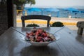 Greek salad on a table near the sea Royalty Free Stock Photo