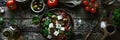 Greek salad top down shot with fresh ingredients and olive oil dressing on wooden table Royalty Free Stock Photo