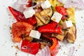 Greek salad, vegetables with cheese. Grilled vegetables eggplant, paprika, onions. Serving on a wooden Board on a rustic Royalty Free Stock Photo