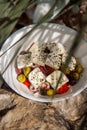 Greek salad in white bowl in the shade Royalty Free Stock Photo