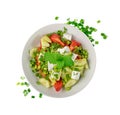 Greek Salad in White Bowl Top View Isolated. Fresh Garden Salat, Greek Salad with Green Onion, Feta Cheese Royalty Free Stock Photo