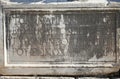 Greek script ancient letters on a rock in Ephesus, Turkey. Royalty Free Stock Photo