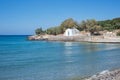 Greek small church chapel by the sea beach Royalty Free Stock Photo