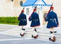 Greek soldiers Evzones walking away in traditional uniform in Athens, Greece Royalty Free Stock Photo