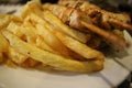 Greek souvlaki with crispy potatoes and lemon