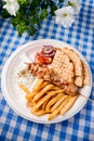 Greek souvlaki with pita bread and vegetables close-up on the table Royalty Free Stock Photo