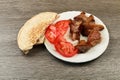 Greek souvlaki with pita bread and vegetables close-up on the table. Pork table Royalty Free Stock Photo