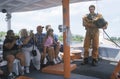 Greek sponge diver talks to tourists