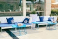 Greek style furniture on the sidewalk. Royalty Free Stock Photo