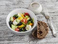 Greek style salad on a rustic light wood background Royalty Free Stock Photo