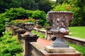 Greek style urns decorate a terrace in the summer