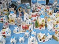 Greek style white and blue churches and houses, souvenirs for sale at Oia village on Santorini island