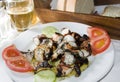 Greek taverna specialty marinated grilled octopus Royalty Free Stock Photo