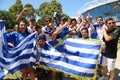 Greek tennis fans support tennis player Stefanos Tsitsipas during his quarter final match at Australian Open 2019