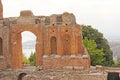 Greek Theater in the City of Taormina, Sicily Island, Italy. Old and Ancient Stone Ruins. Old Greek Columns, Greek Style Royalty Free Stock Photo