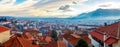 Greek town evening panorama with red roof houses in the valley with sunset mountains, Kalabaka, Thessaly