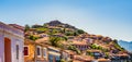 Greek town of Molyvos Mithymna and an impressive fort or castle on top of the hill in the background.