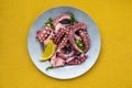Greek traditional, sea food - Octopus with olive oile and lemon juice. Octopus Ceviche Royalty Free Stock Photo