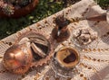 Greek Turkish brewed coffee and marble halva on a table with a handmade tablecloth and a copper coffee maker and candy maker on Royalty Free Stock Photo