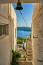 Greek village typical view with whitewashed houses and stairs. Plaka town, Milos island, Greece