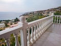 Greek white balcony with balusters sea view Athens Royalty Free Stock Photo