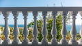 Greek white balcony balusters summer blue sea view Royalty Free Stock Photo