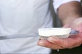 Greek white feta cheese knife Royalty Free Stock Photo