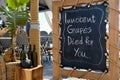 Greek Wine Bar With Funny Sign