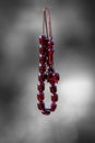 Amber greek traditional rosary on blurry background. Greek worry beads. Komboloi, orthodox rosary used frequently by men Royalty Free Stock Photo