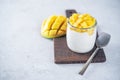 Greek yogurt mango parfait in jars