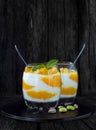 Greek yogurt and Mango pieces in glasses with