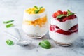 Greek yogurt strawberry and mango parfait in glasses