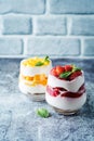 Greek yogurt strawberry and mango parfait in glasses