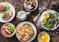 Greek yogurt with whole grain cereals and berry sauce, pancakes, arugula, cherry tomatoes, boiled eggs salad, kiwi, apples fruit,