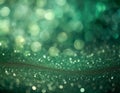 Green abstract bokeh glittery background with defocused light Royalty Free Stock Photo