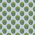 Green acorn doodle silhouettes seamless pattern. Light blue background. Nature print