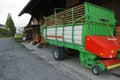 Green agriculture truck trailer for crops and products with electrohydraulic actuation and control. Royalty Free Stock Photo