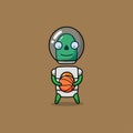 Green alien carrying basket ball