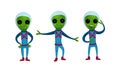 Green Alien Creatures in Spacesuit Standing and Waving Hand Vector Set Royalty Free Stock Photo