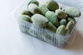 Green Almond Nut Fruits in Plastic Box / Container Royalty Free Stock Photo