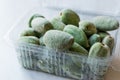 Green Almond Nut Fruits in Plastic Box / Container Royalty Free Stock Photo