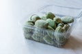 Green Almond Nut Fruits in Plastic Box / Container Royalty Free Stock Photo