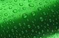Green aluminum can with water drops close-up macro shot Royalty Free Stock Photo
