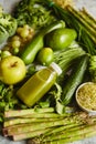 Green antioxidant organic vegetables, fruits and herbs placed on gray stone Royalty Free Stock Photo