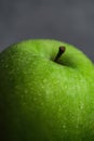 green apple on the black background Royalty Free Stock Photo