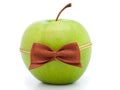 Green apple with bow-tie Royalty Free Stock Photo