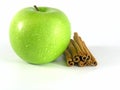 Green apple with cinnamon Royalty Free Stock Photo